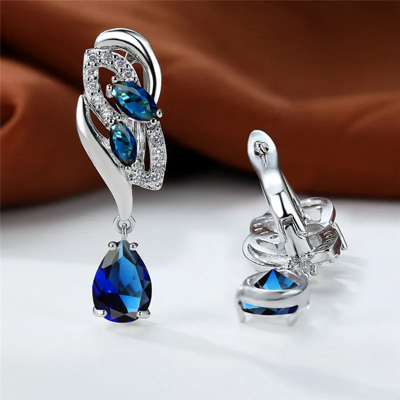 Luxury blue rainbow stone earrings for women featuring elegant, vibrant gemstones and sophisticated design.