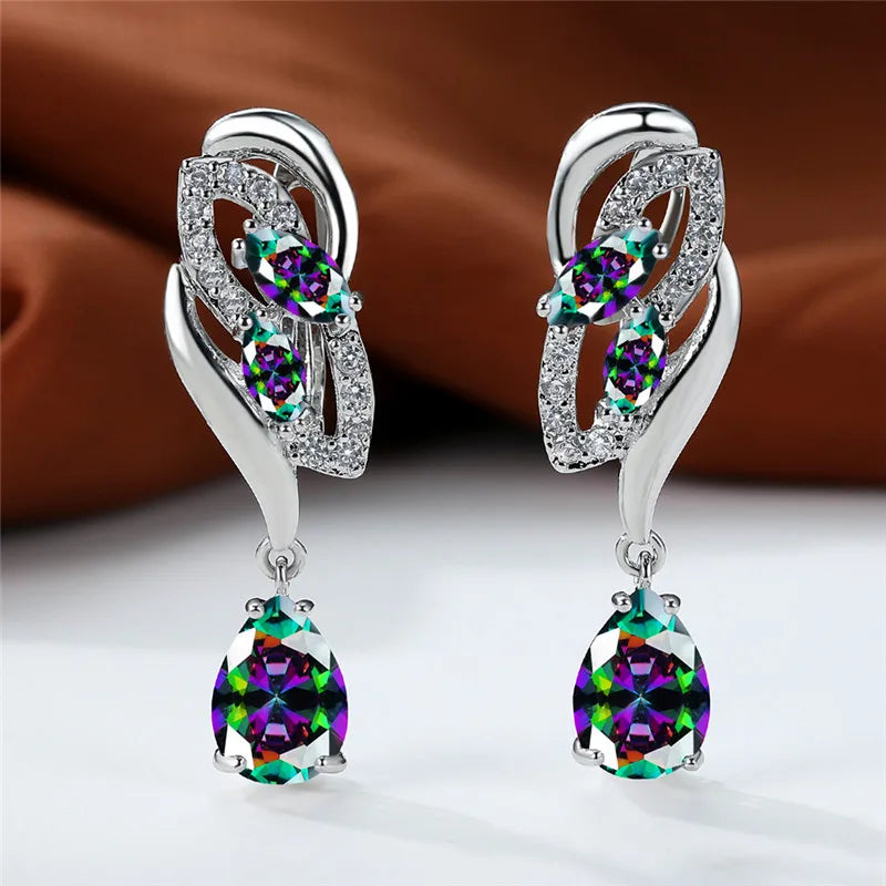 Blue rainbow stone luxury earring for women, featuring an elegant arch design with vibrant gemstone accents.