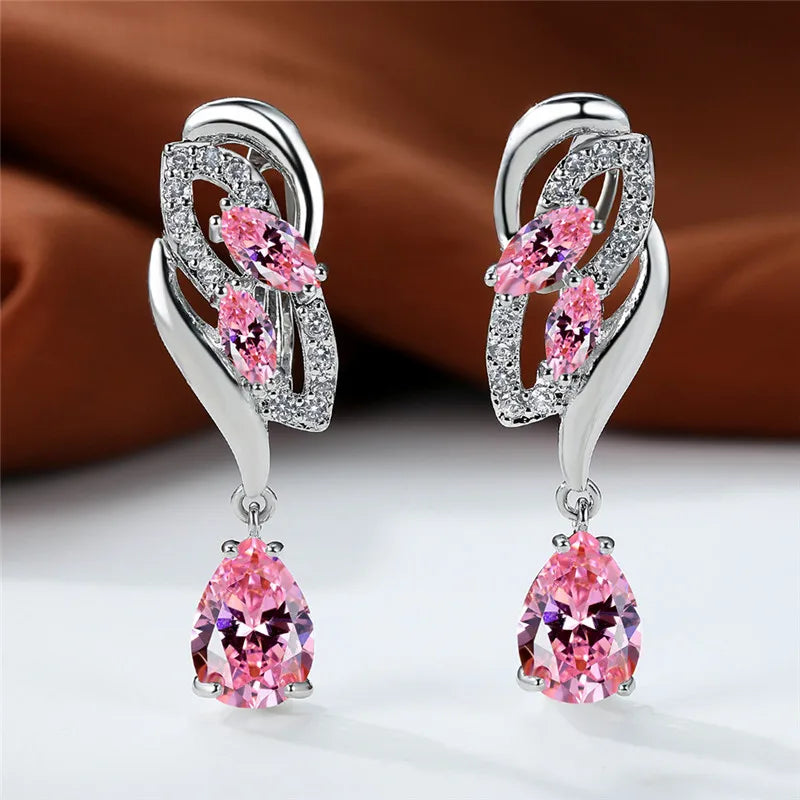 Luxury blue rainbow stone earrings for women featuring elegant design and vibrant gemstone details.