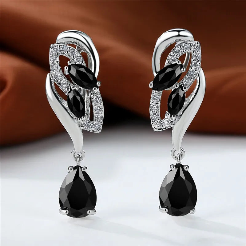 Blue rainbow stone luxury earring for women, featuring elegant design and vibrant gemstone detail by Corporación Turística.