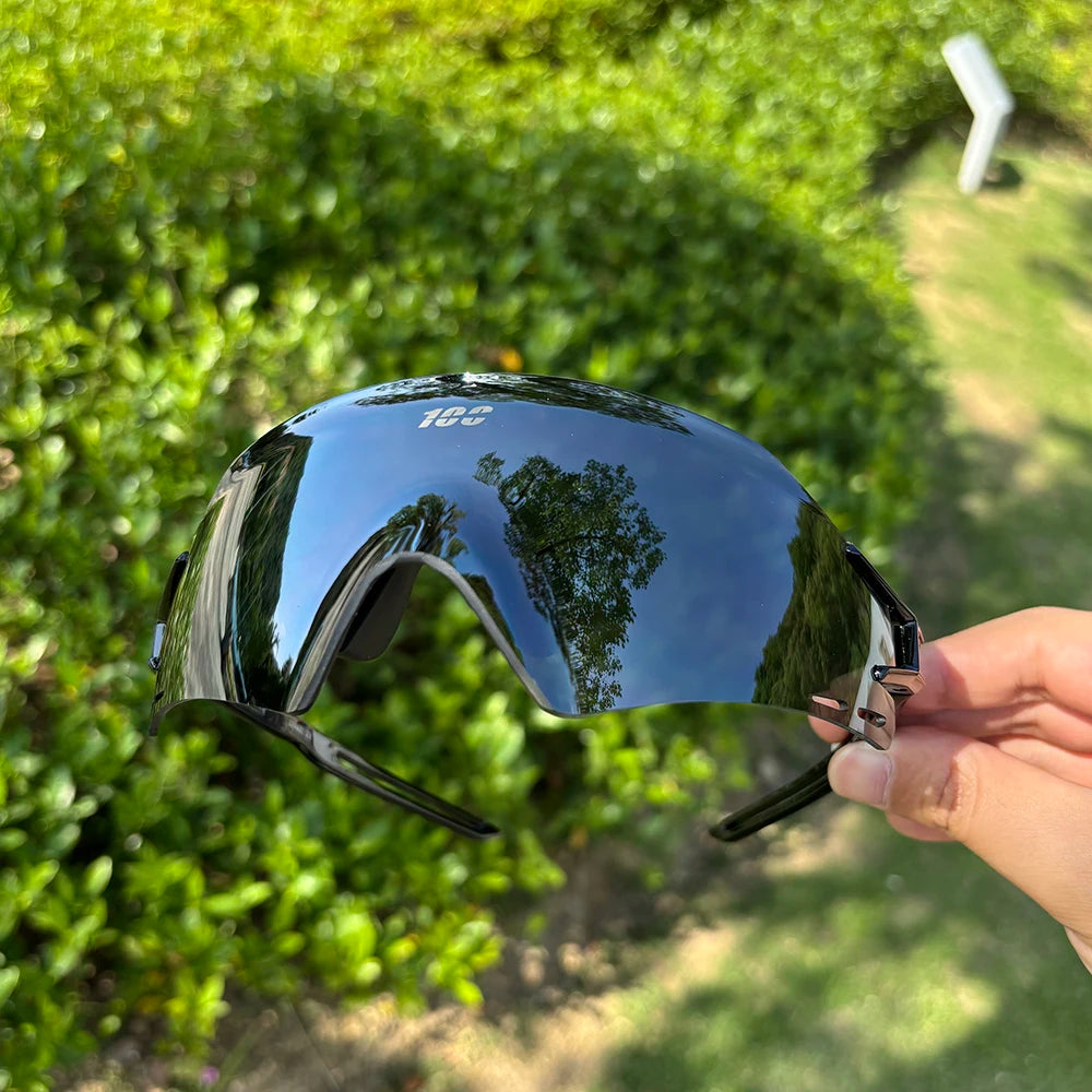 Photocromic cycling sunglasses with UV400 protection for men, designed for mountain biking, road cycling, running, and sports.