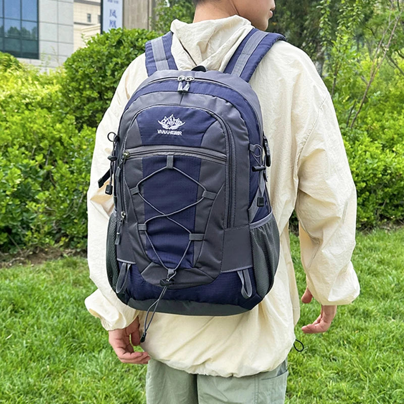 Orange OGEHUAFEE hiking backpack by Corporación Turística, featuring multiple compartments and adjustable straps for outdoor adventures.