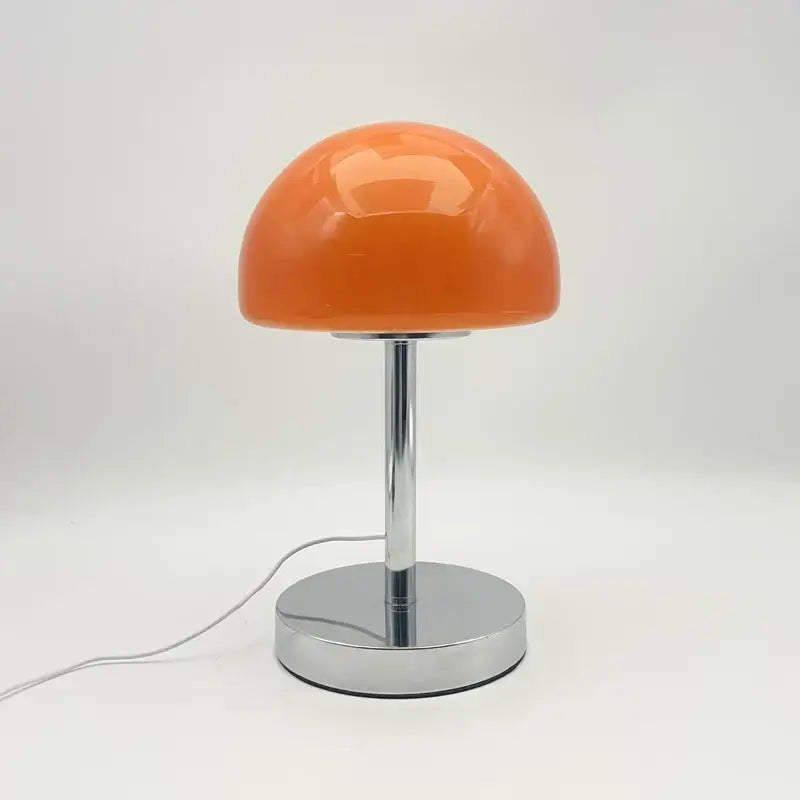 Cristal table lamp with mushroom-shaped shade and orange base, decorative lighting from Corporación Turística.