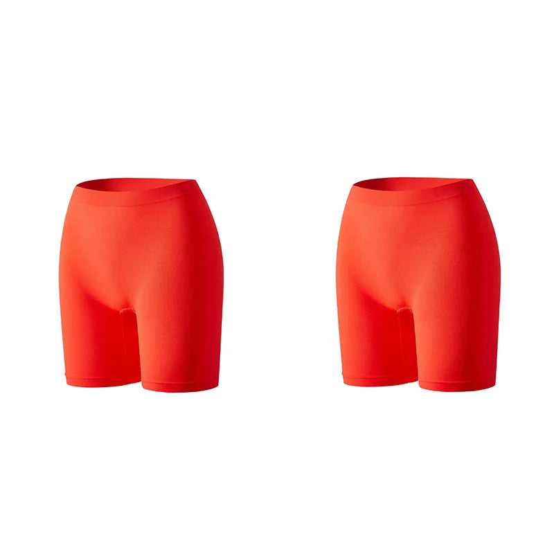 Set of three orange women's safety shorts by Corporación Turística, featuring durable fabric and secure fit for work safety.