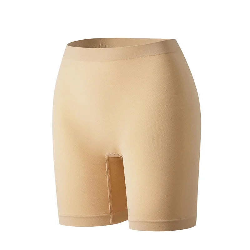Set of three women's security shorts by Corporación Turística in bright orange, shown flat with waistband and pockets visible.