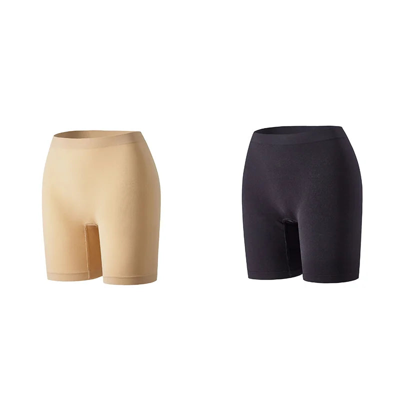 Set of three orange safety shorts for women from Corporación Turística, featuring durable fabric and secure fit.