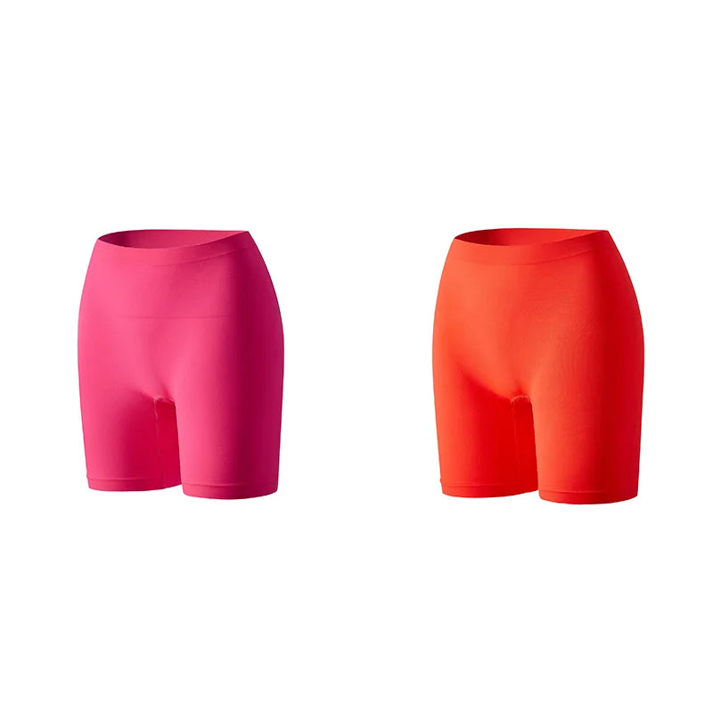 Orange women's safety shorts in a 1/2/3-piece set, featuring durable fabric and secure fit, by Corporación Turística.