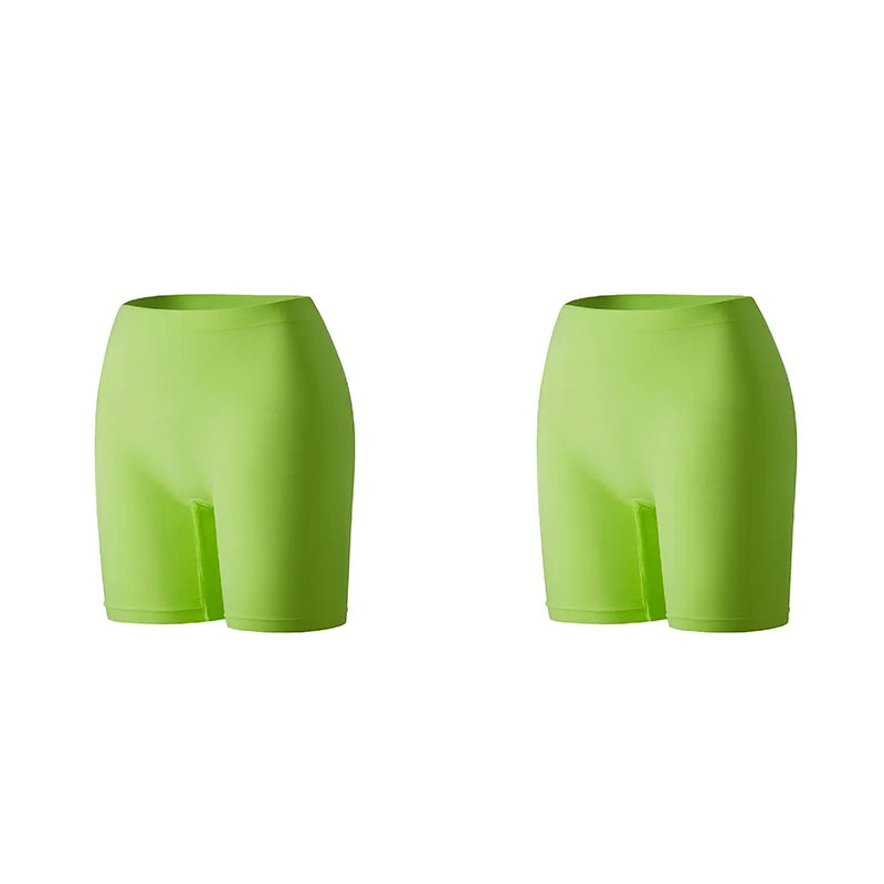 Set of three women's safety shorts in bright orange by Corporación Turística, featuring durable fabric and secure fit.