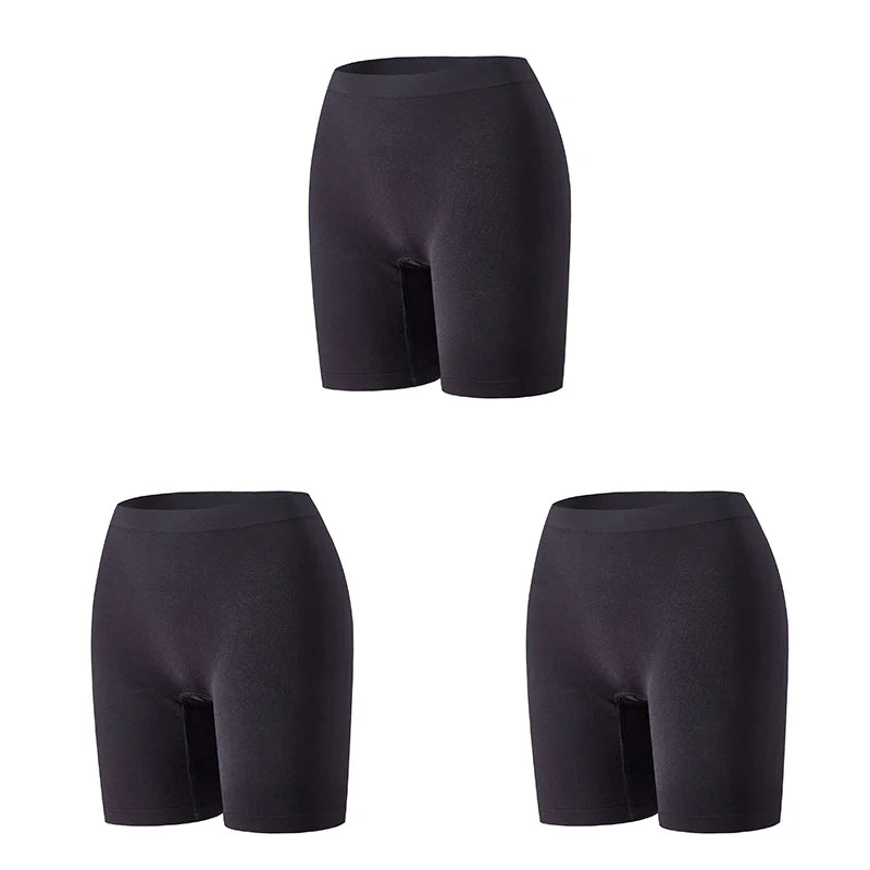 Set of three orange women's safety shorts by Corporación Turística, featuring durable fabric and adjustable waistbands.