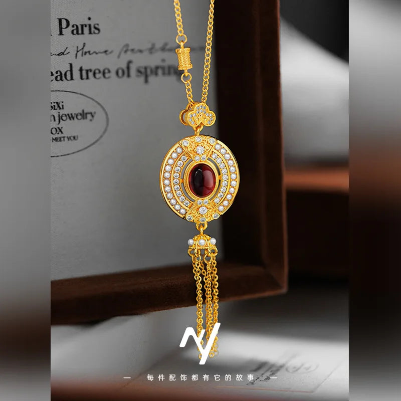 Gold collar de clavícula para mujer con borla de rubí ovalado, elegante y delicado accesorio de Corporación Turística.