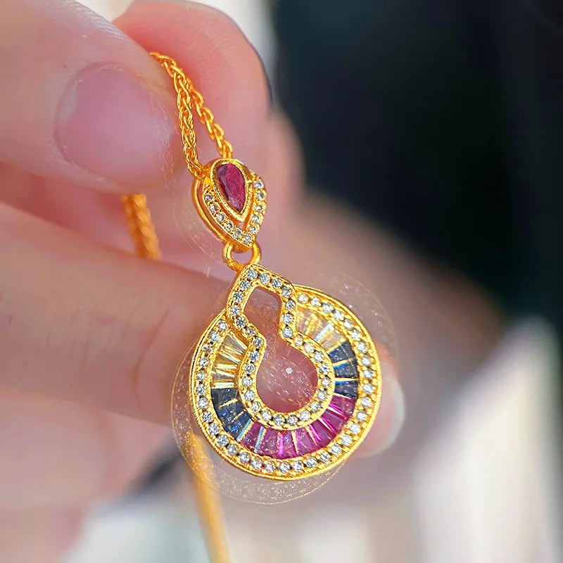 Luxury gold necklace with real diamond pendant, 24K gold, featuring intricate design and sparkling gemstone.
