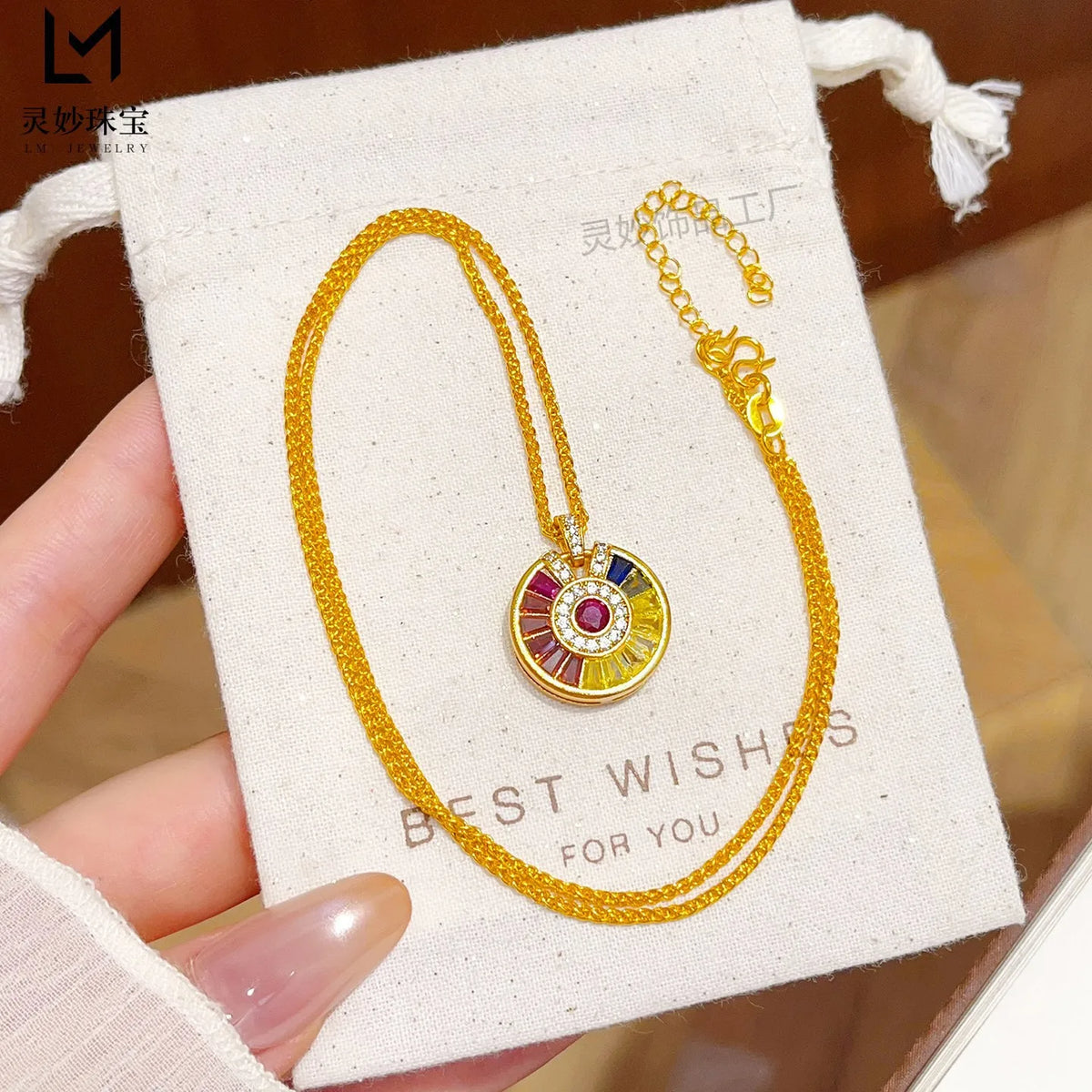 Luxury gold collar with rainbow disco pendant, crafted by Corporación Turística, featuring a vibrant, shiny gold disc pendant.