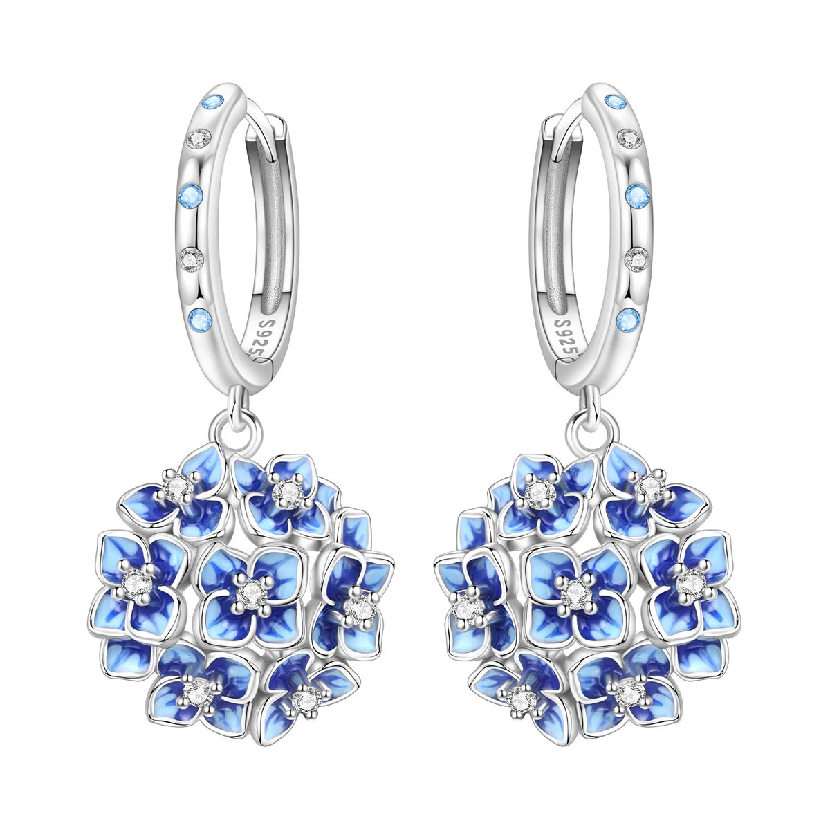 Panpoki Original Plata de Ley 925 floral earrings by Corporación Turística, detailed silver flower design, shiny and elegant.