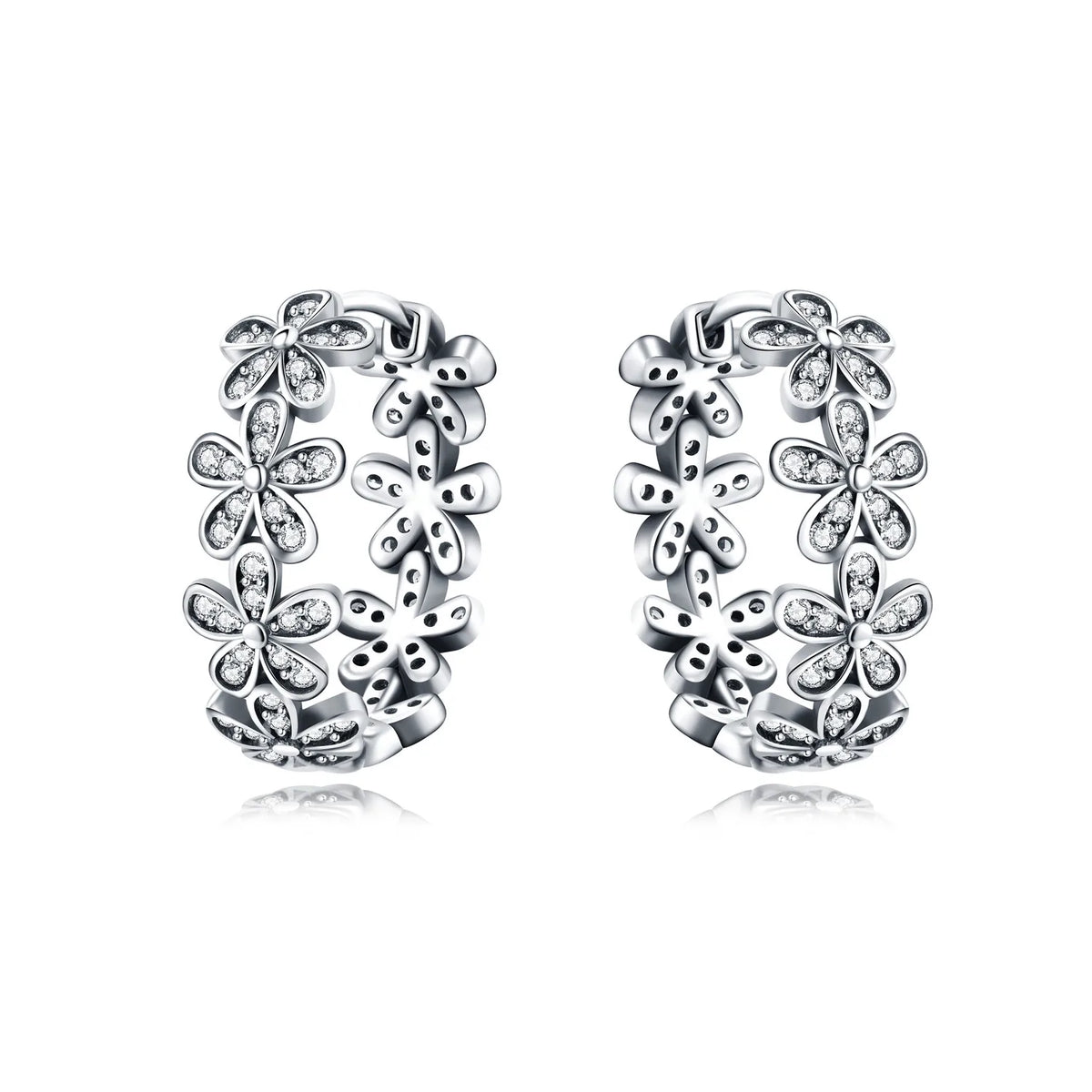 Panpoki Original Plata de Ley 925 floral earrings by Corporación Turística, featuring detailed flower designs in sterling silver.