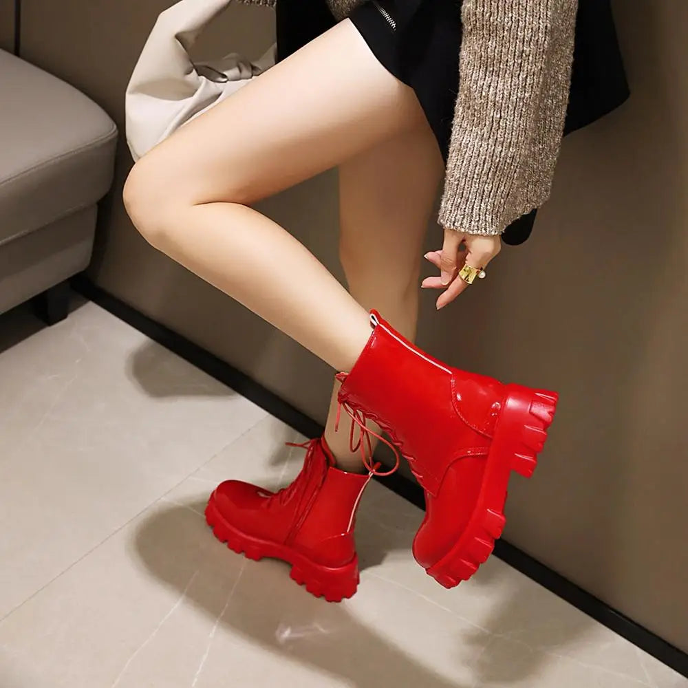 White patent leather platform ankle boots for women, with short plush lining, from Corporación Turística.