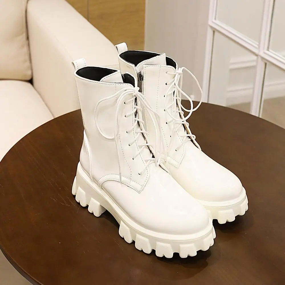 White patent leather platform ankle boots for women with a short plush lining, stylish and comfortable by Corporación Turística