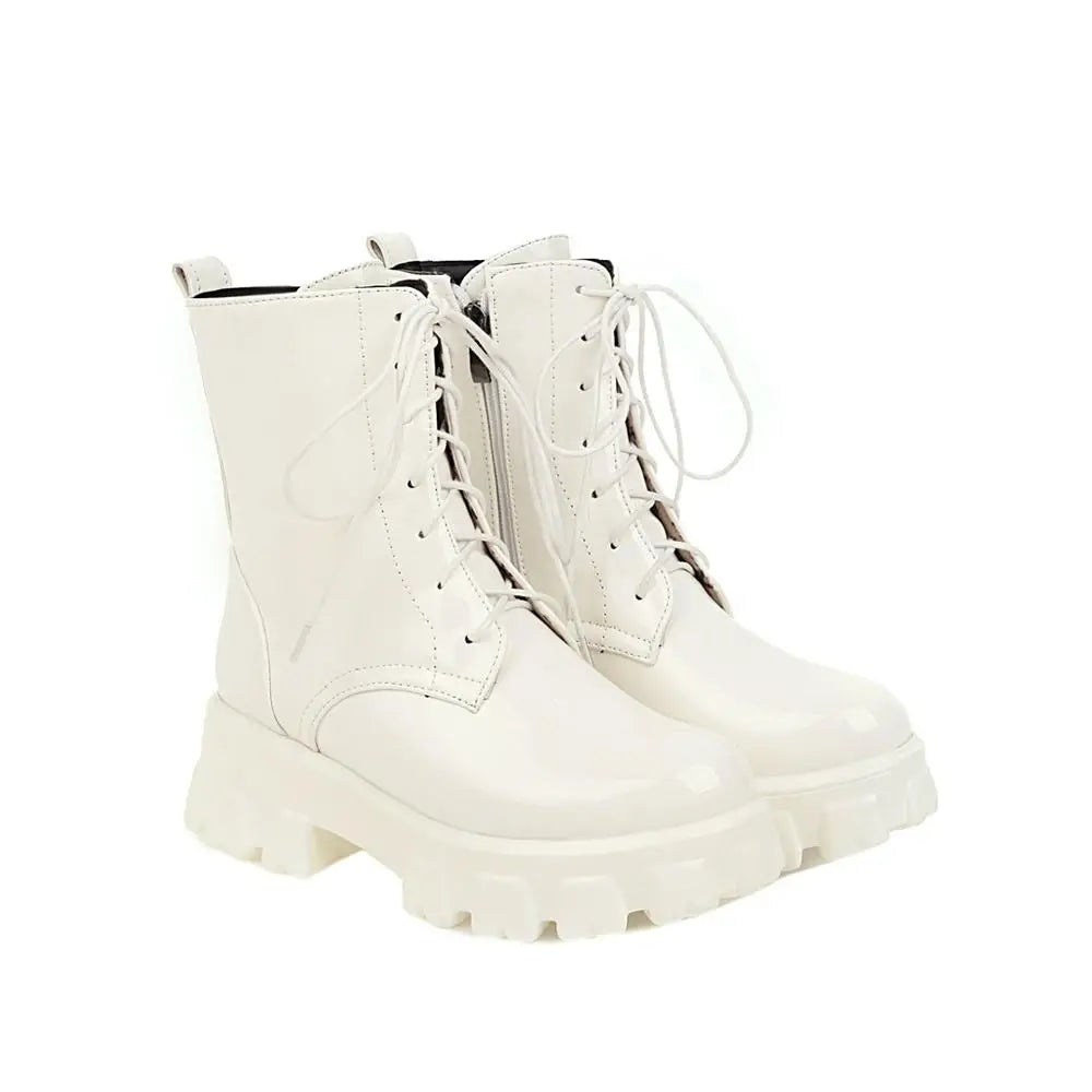 White patent leather women's platform boots with short plush lining, stylish ankle-length botines by Corporación Turística.