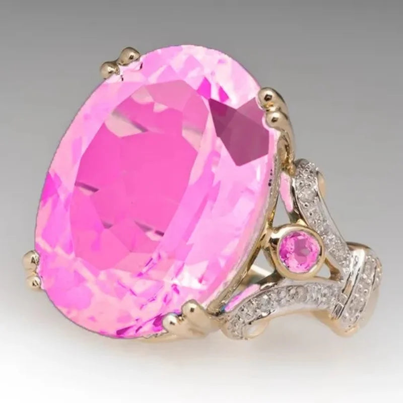 Exquisitos anillos ovalados de Corporación Turística con incrustaciones de circón, mostrando detalles brillantes y elegante diseño.