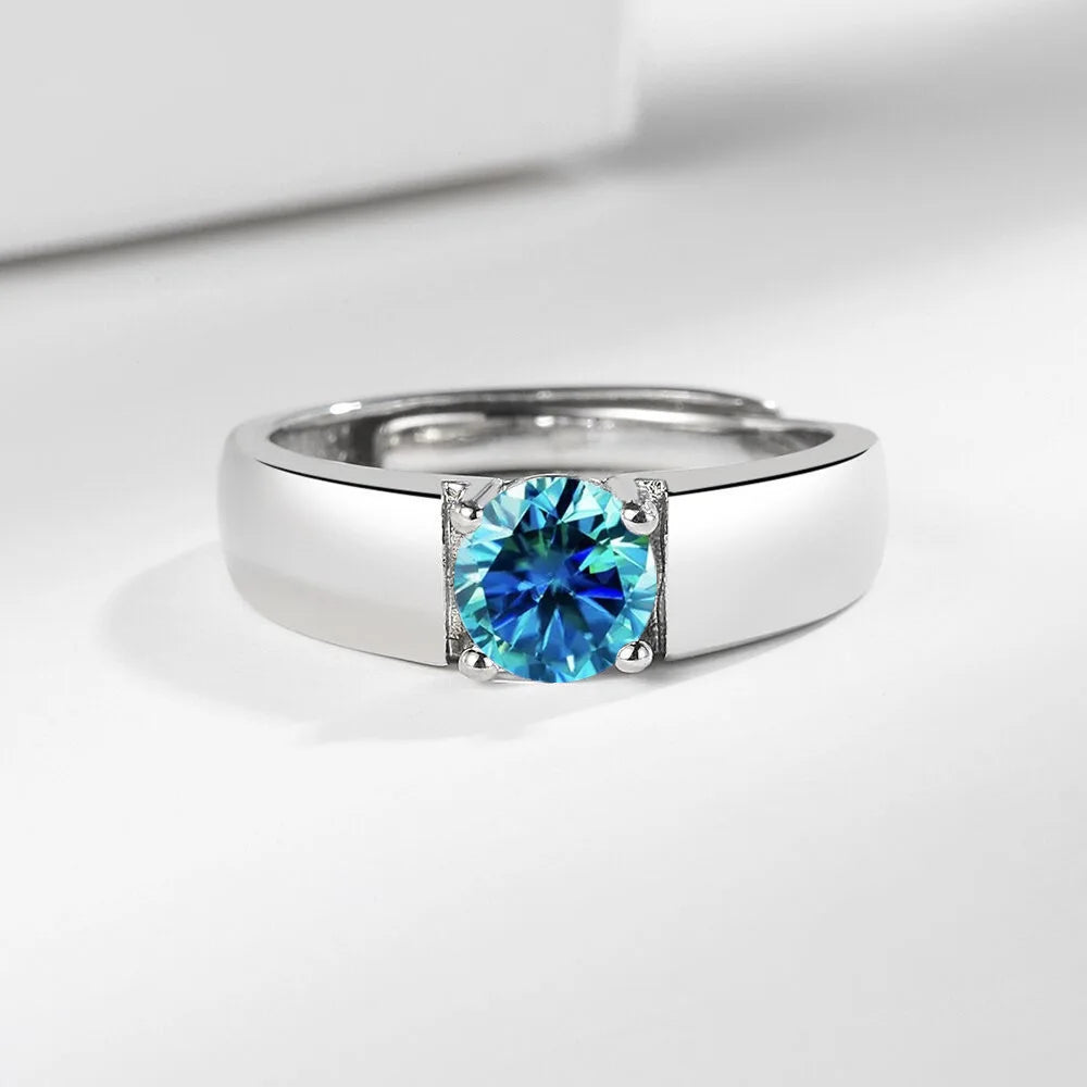 Sterling silver 925 men's moissanite ring with pink accents, showcasing a sleek design and sparkling gemstone.