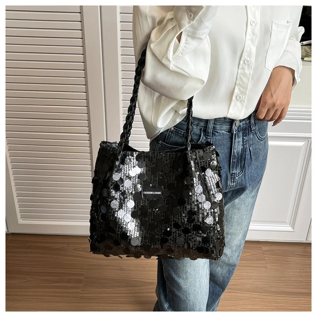 Pink shiny tote bag with sequin embellishments, perfect for women, by Corporación Turística.