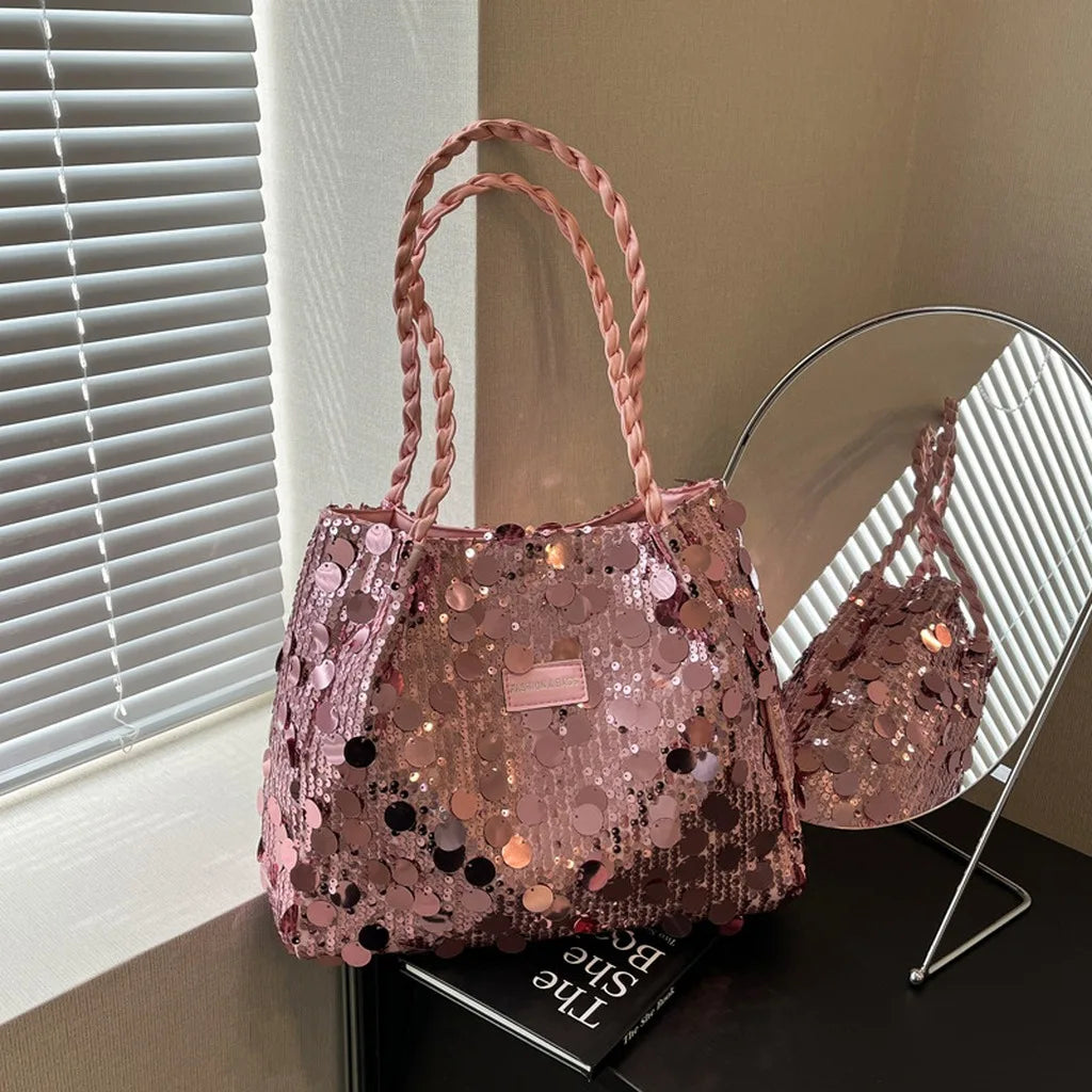 Pink shiny tote bag with sequin embellishments for women, featuring a spacious design and sturdy handles.