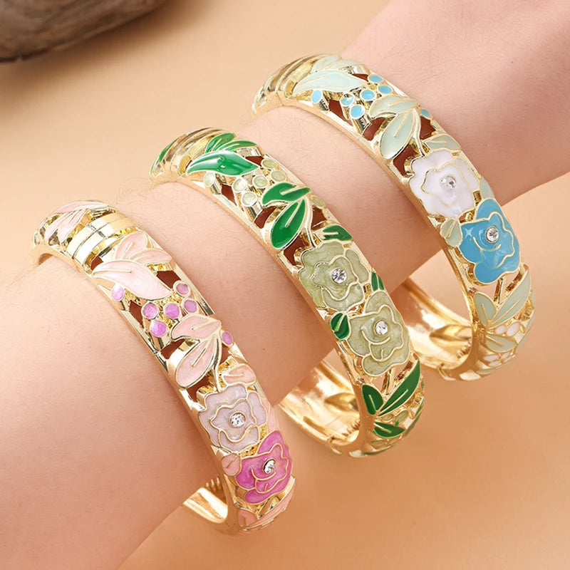 Pink floral enamel bracelet for women by Corporación Turística, featuring rose flower designs in a stylish jewelry piece.
