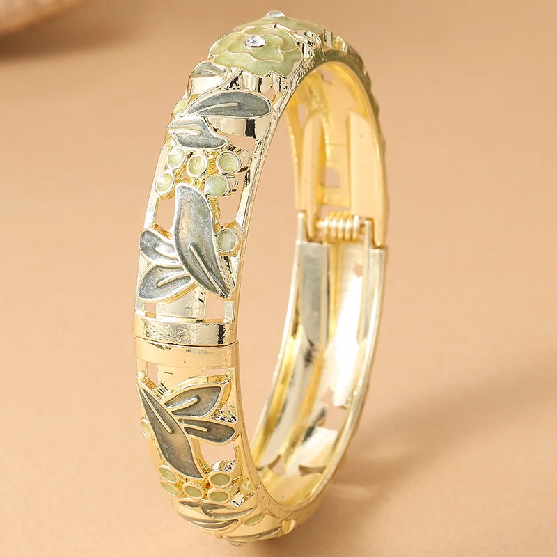Pink floral enamel bracelet for women by Corporación Turística featuring rose flower designs on a stylish jewelry piece.