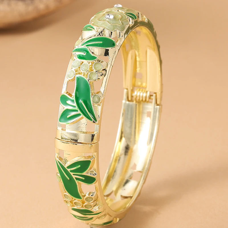Pink floral enamel bracelet for women featuring rose flower designs by Corporación Turística.