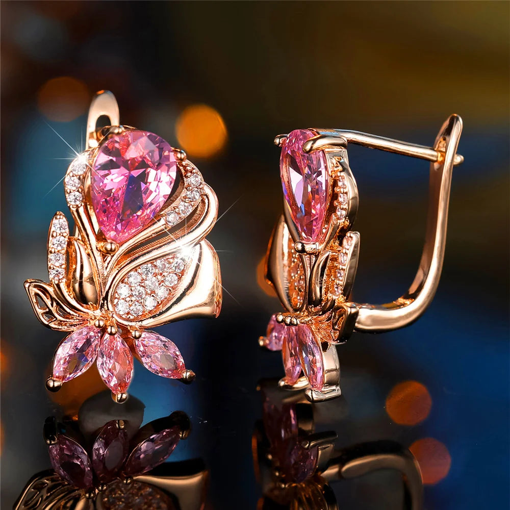 Luxury pink cubic zirconia hoop earrings from Corporación Turística, showcasing elegant rose-colored stone jewelry.