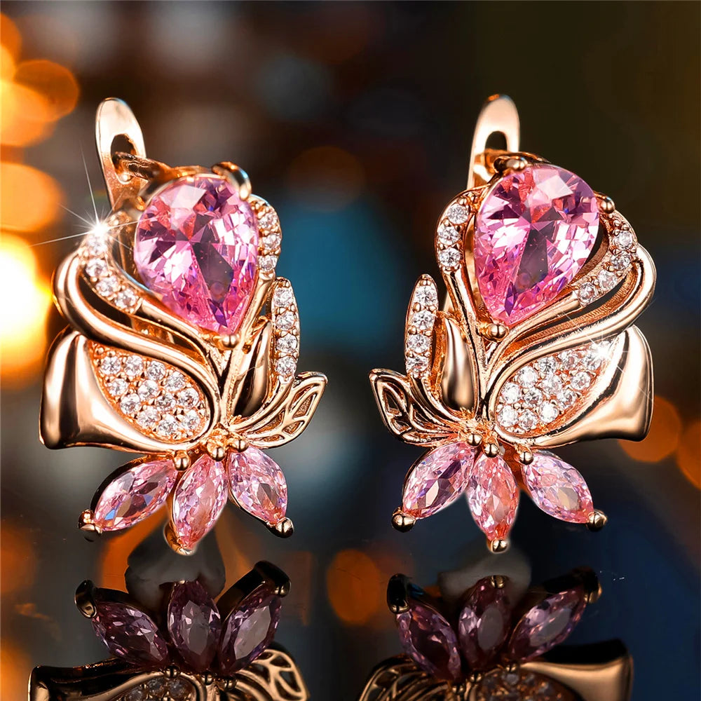 Luxury pink zircon hoop earrings from Corporación Turística featuring sparkling pink stone for elegant style.