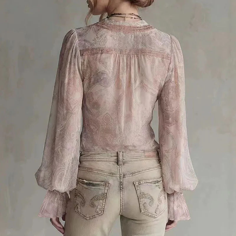 Pink transparent blouse for women with retro print by Corporación Turística, featuring a stylish and lightweight design.
