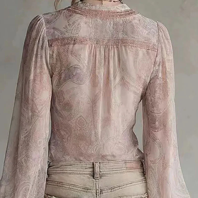 Pink transparent blouse with retro print for women by Corporación Turística, featuring a stylish, see-through design and vintage pattern.