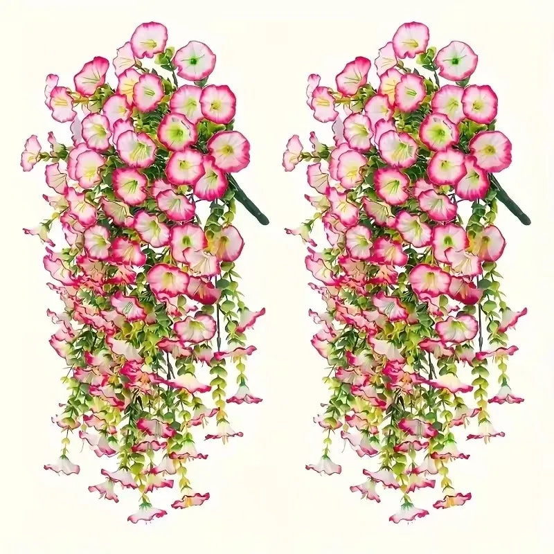 Two sets of hanging eucalyptus and gloria morning decorations in pink and white for festive or event decor.