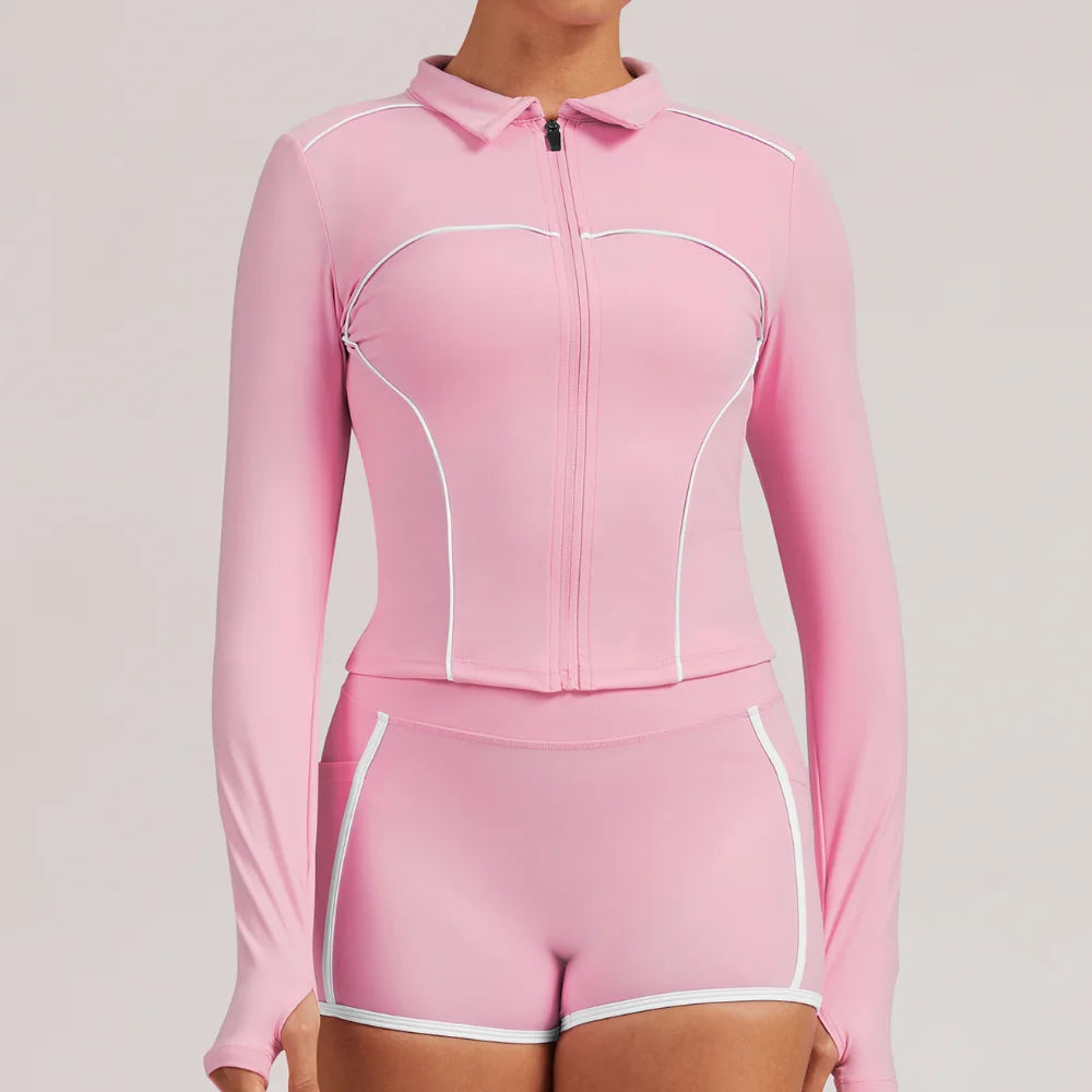 Pink yoga jacket for women from Corporación Turística, suitable for training and gym workouts, shown on a woman.