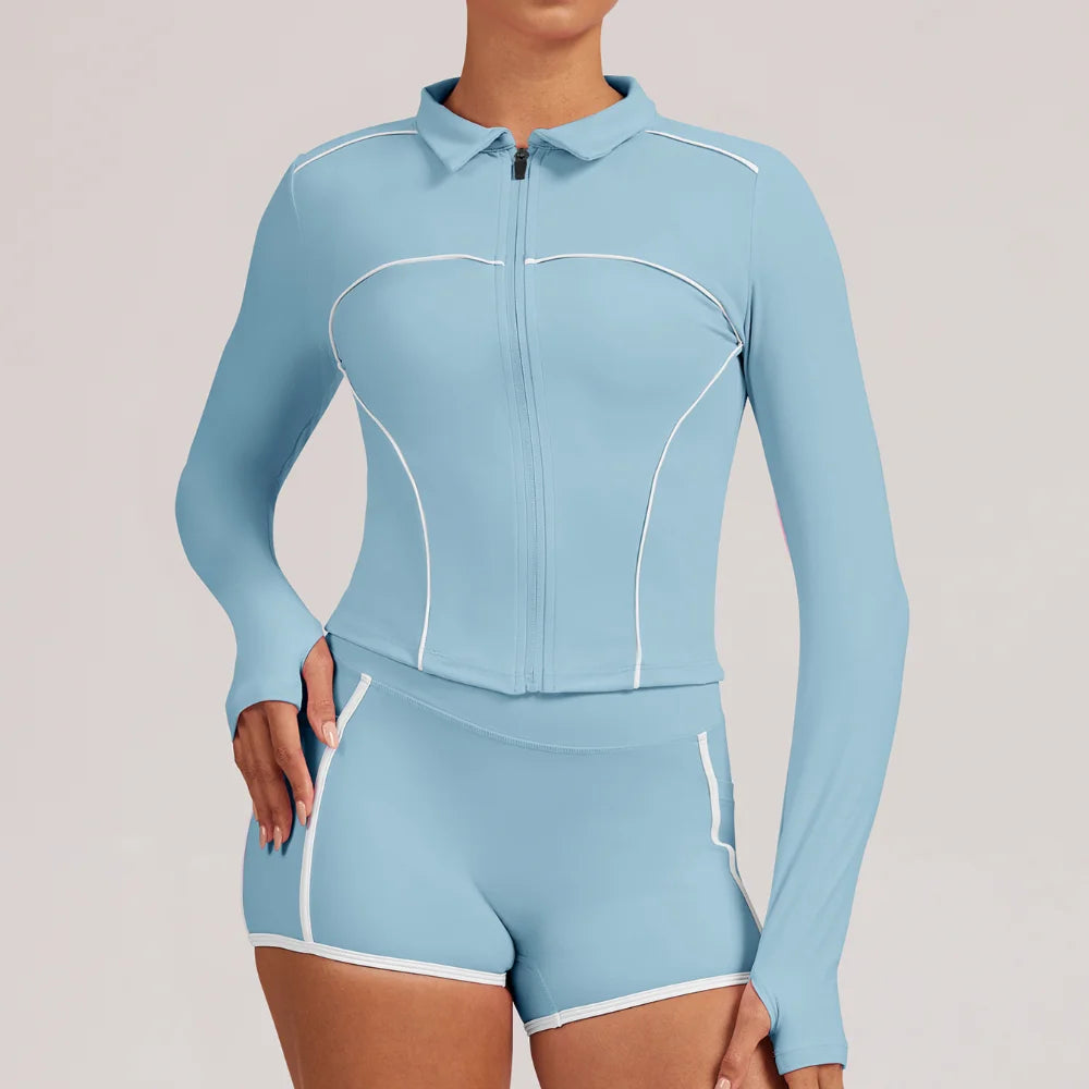Pink women's yoga jacket from Corporación Turística, suitable for training and gym workouts, shown on a mannequin.
