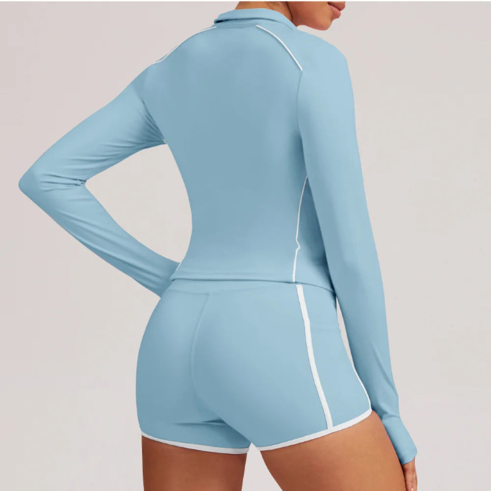 Pink women's yoga jacket by Corporación Turística, lightweight and comfortable for training and gym workouts.