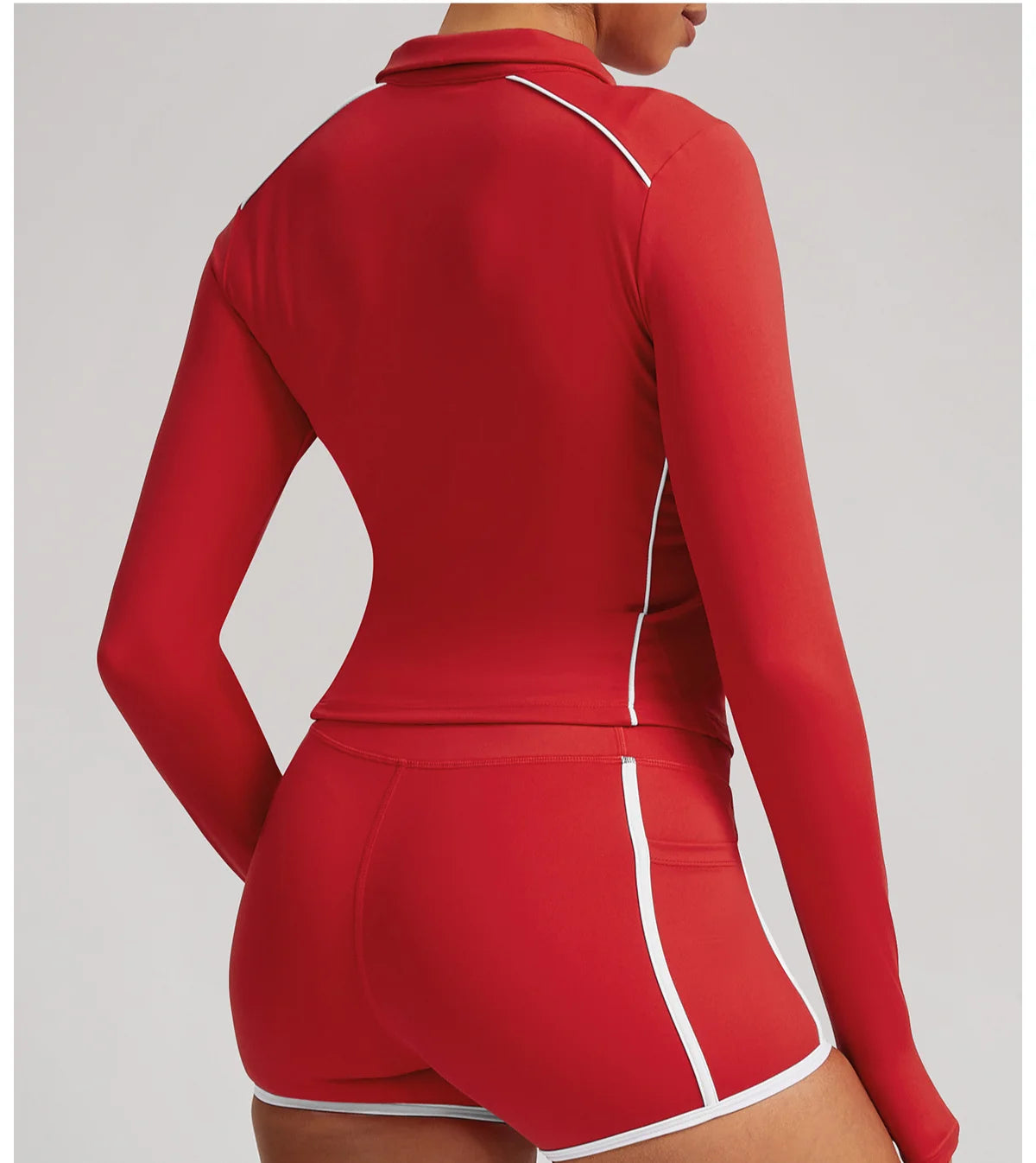 Pink women's yoga jacket by Corporación Turística, suitable for training and gym workouts, shown on a mannequin.