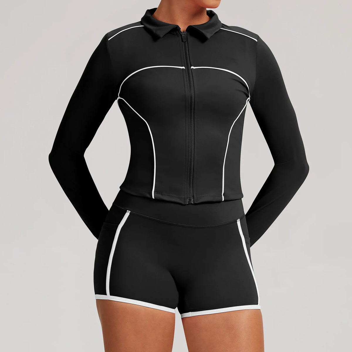 Pink women's yoga jacket from Corporación Turística, suitable for training and gym, with a comfortable fit and sporty design.