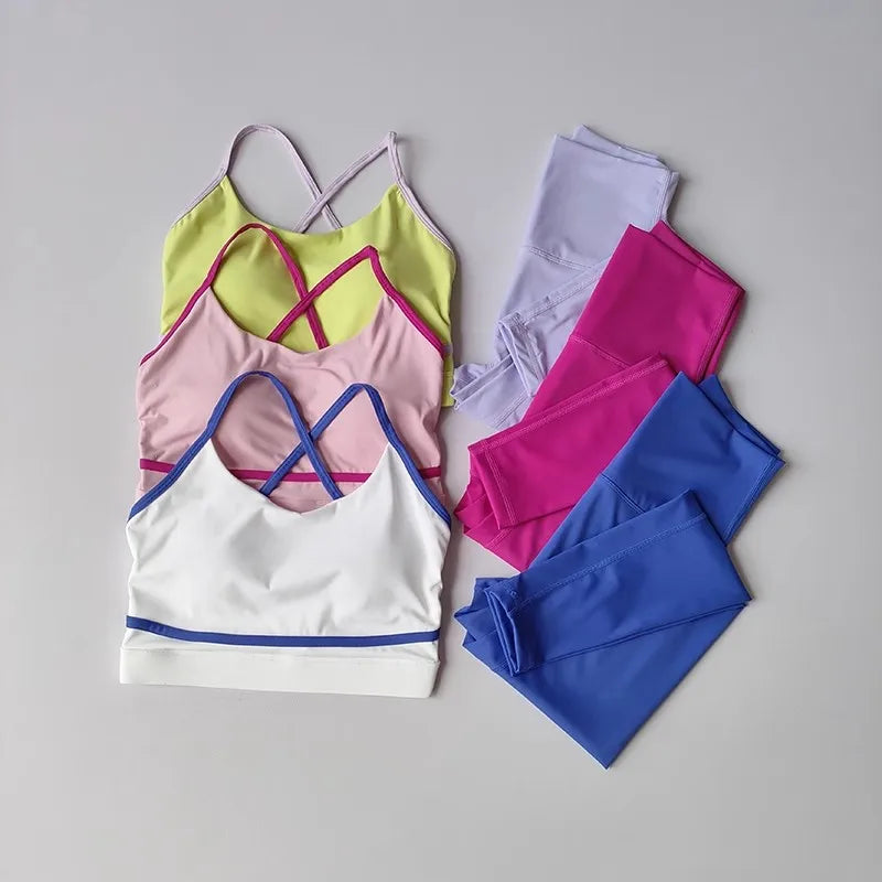 Pink 2-piece women's yoga set with leggings and top from Corporación Turística, comfortable for active wear.