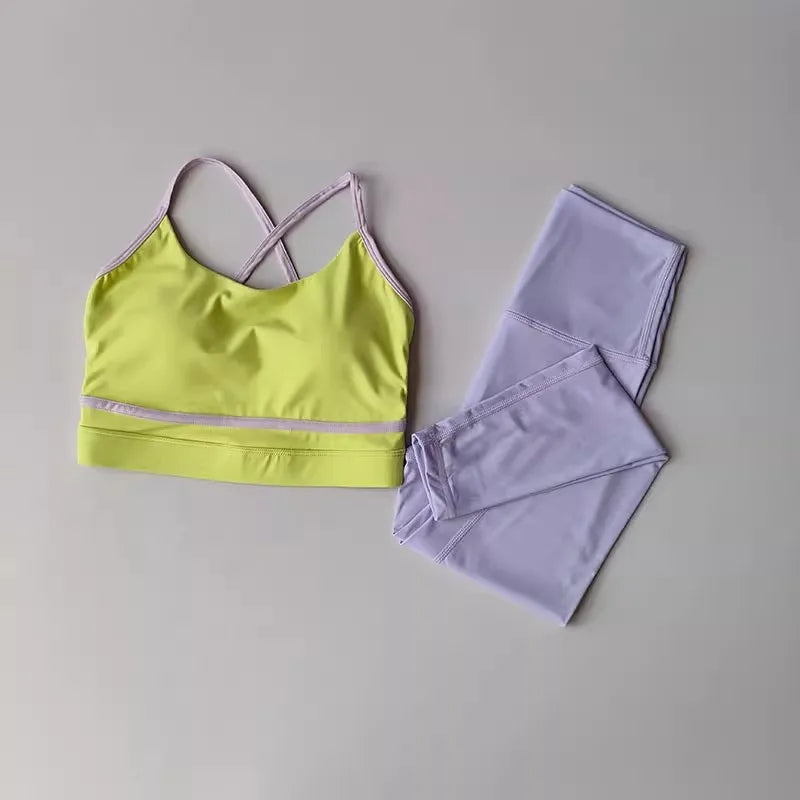Pink women's yoga set with 2-piece leggings and top from Corporación Turística, designed for comfortable workout wear.