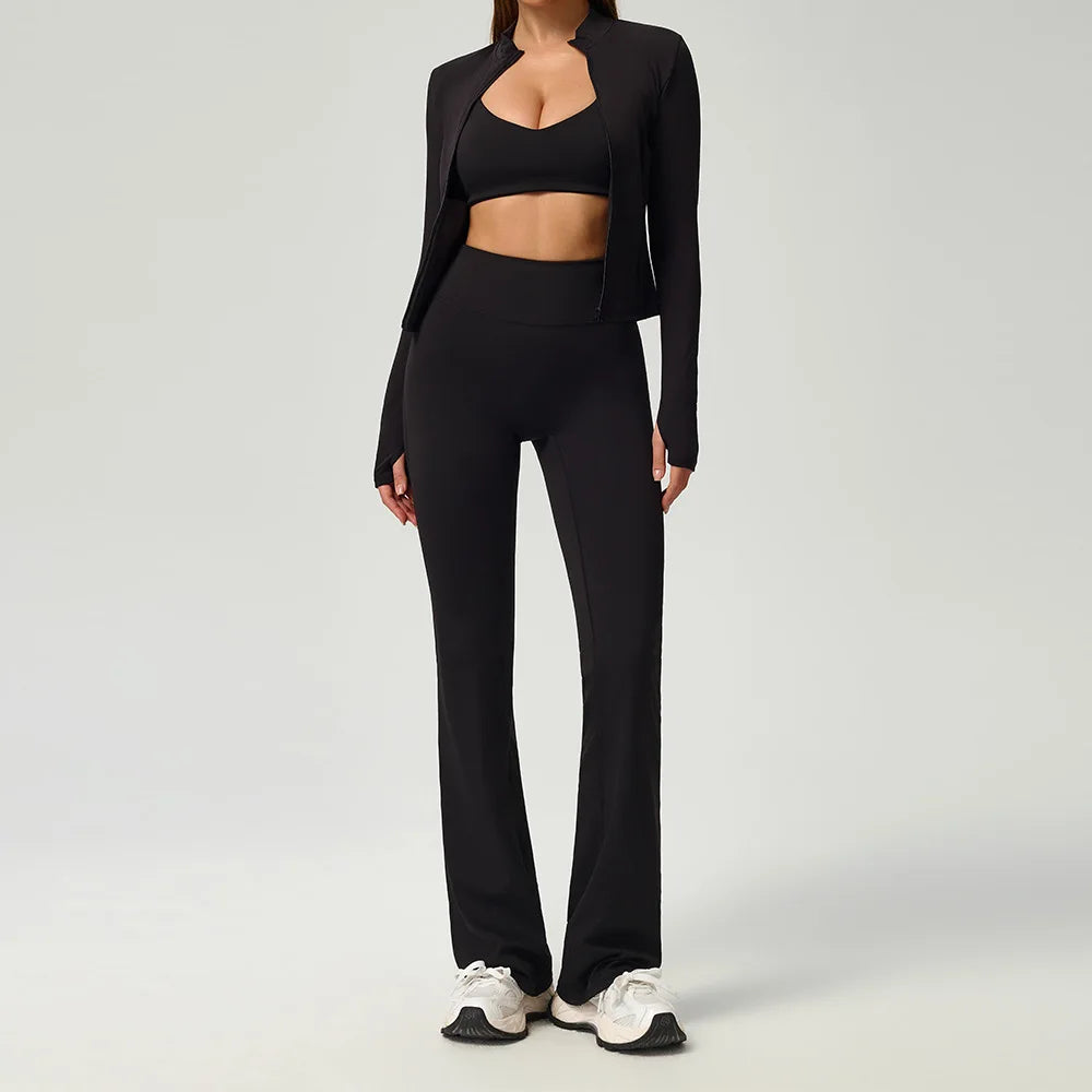 Black 2-piece women's sports set by Corporación Turística, includes a sports top and leggings for active wear.