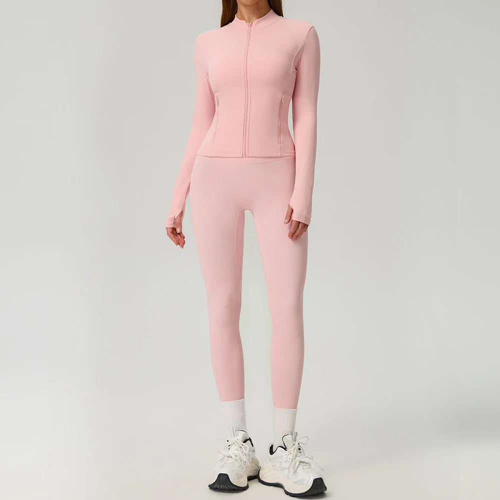 Black 2-piece women's sports set by Corporación Turística, includes athletic top and leggings for active wear.