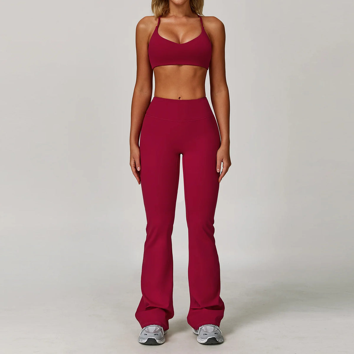 Black 2-piece women’s yoga set by Corporación Turística, includes fitted top and leggings for activewear or yoga practice.