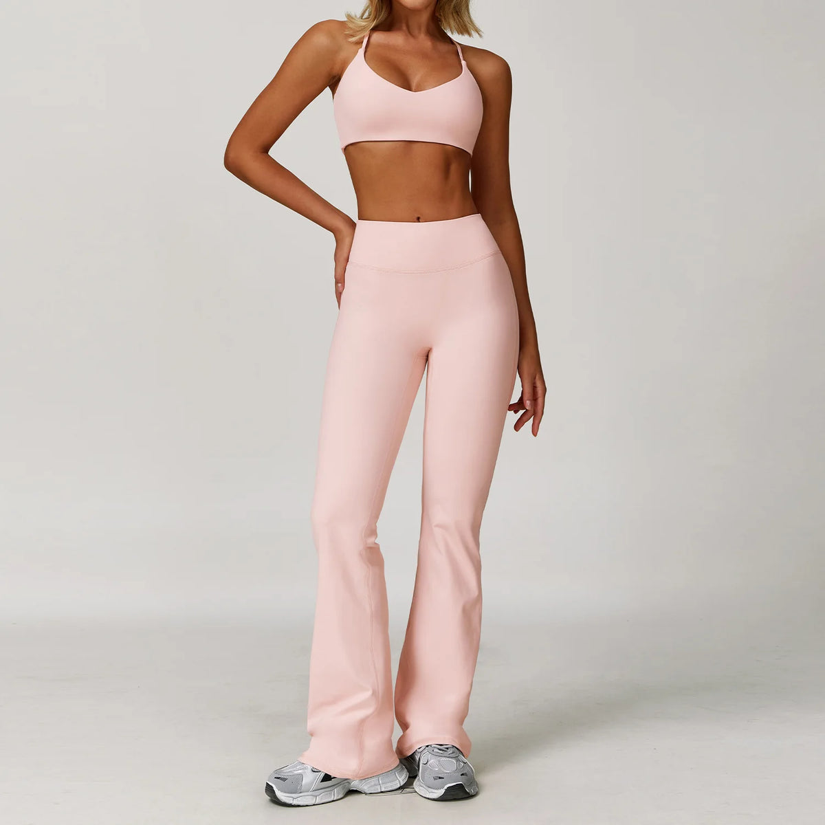 Black 2-piece women's yoga set from Corporación Turística, includes a fitted sports top and leggings for activewear.