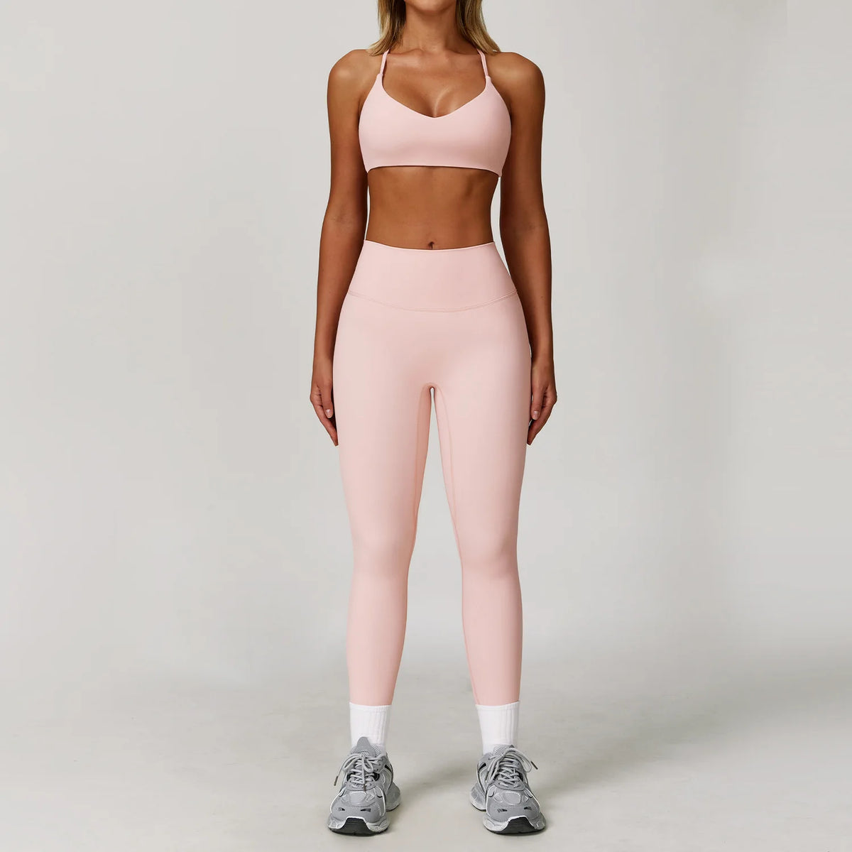 Black 2-piece yoga set for women, including sports bra and leggings, from Corporación Turística, ideal for active workouts.