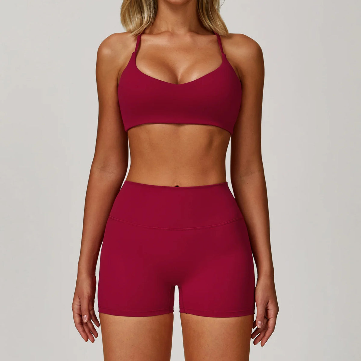 Black 2-piece women’s yoga set from Corporación Turística, includes a sports bra and high-waisted leggings, ideal for active wear.