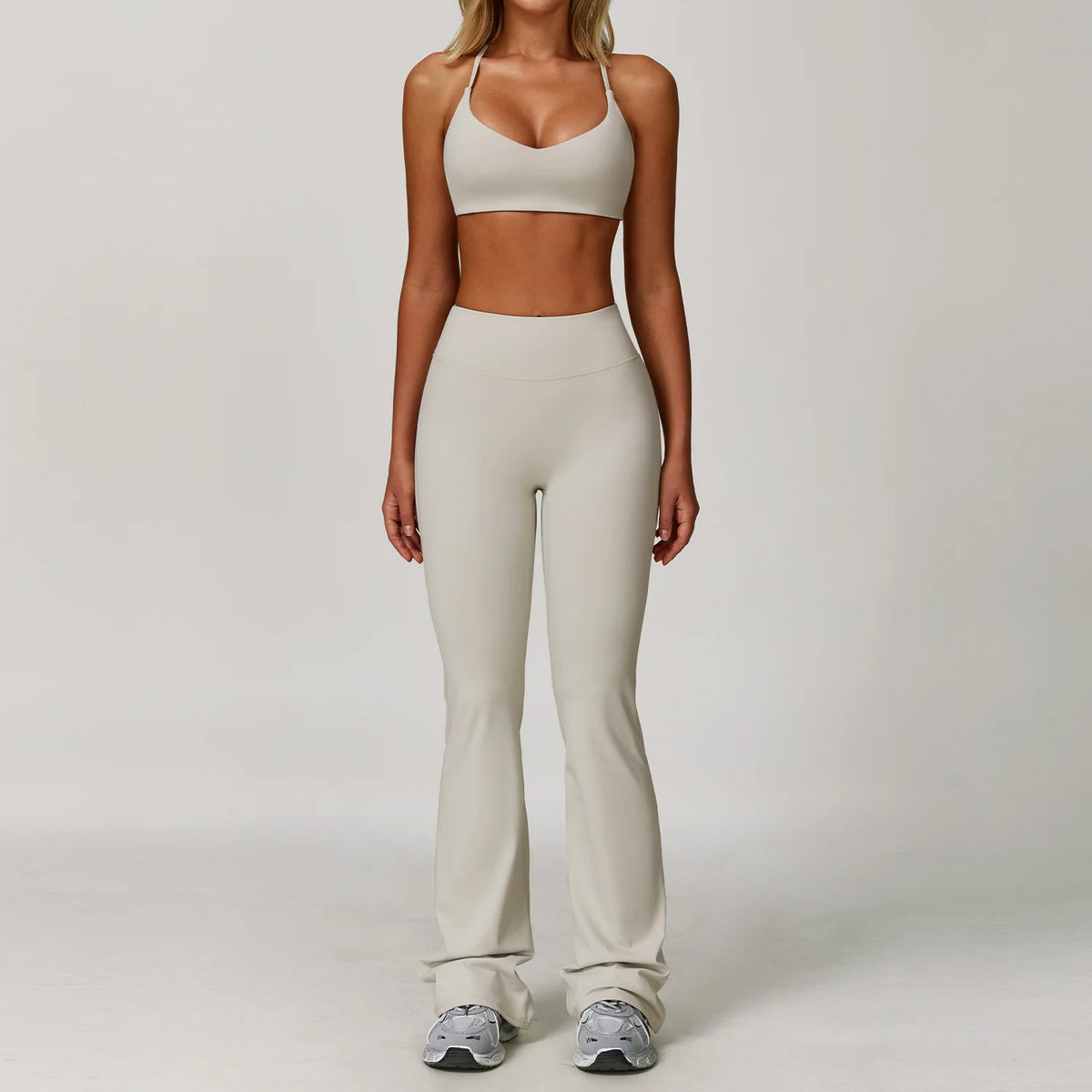Black 2-piece women's yoga set by Corporación Turística, includes a sports bra and leggings for activewear.