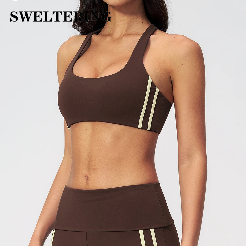 Black women's yoga sports top by Corporación Turística, quick-drying fabric, designed for active workout and yoga sessions.