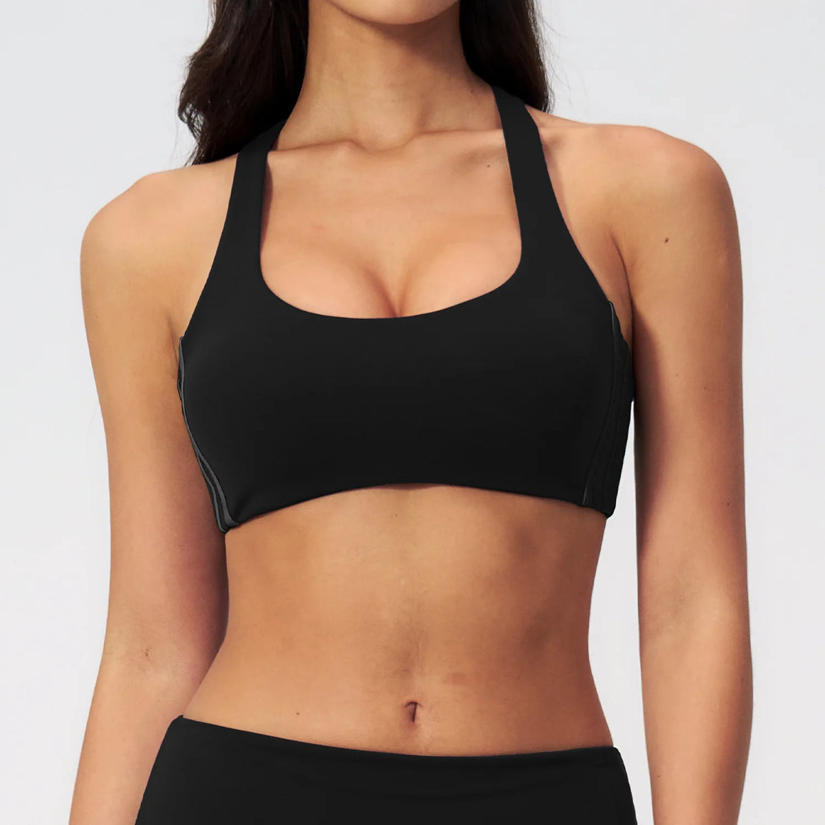 Women's black quick-dry yoga top by Corporación Turística, lightweight and breathable for active exercise or yoga sessions.
