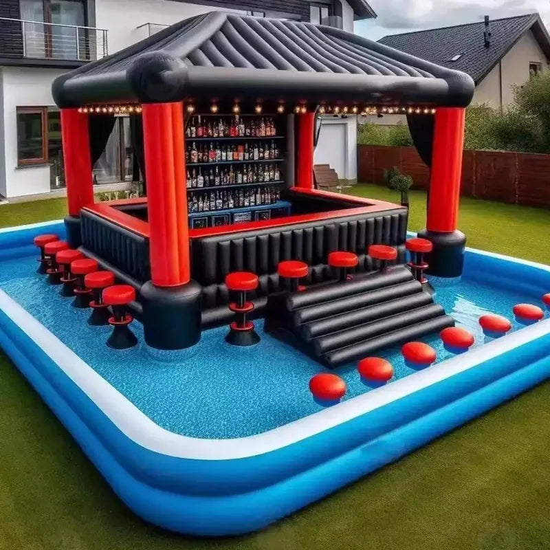 Inflatable swimming pool with floating bar, wrap-around sofa, and built-in bar by Corporación Turística, perfect for outdoor relaxation.